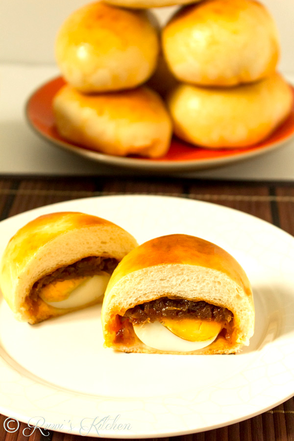 These delicious Sri Lankan Egg and Seeni Sambol Buns are soft, fluffy and filled with spicy caramelized onions and hard-boiled eggs. Excellent for breakfast, snack, Lunchboxes, and picnics.