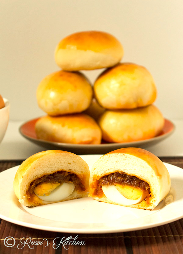 These delicious Sri Lankan Egg and Seeni Sambol Buns are soft, fluffy and filled with spicy caramelized onions and hard-boiled eggs. Excellent for breakfast, snack, Lunchboxes, and picnics.
